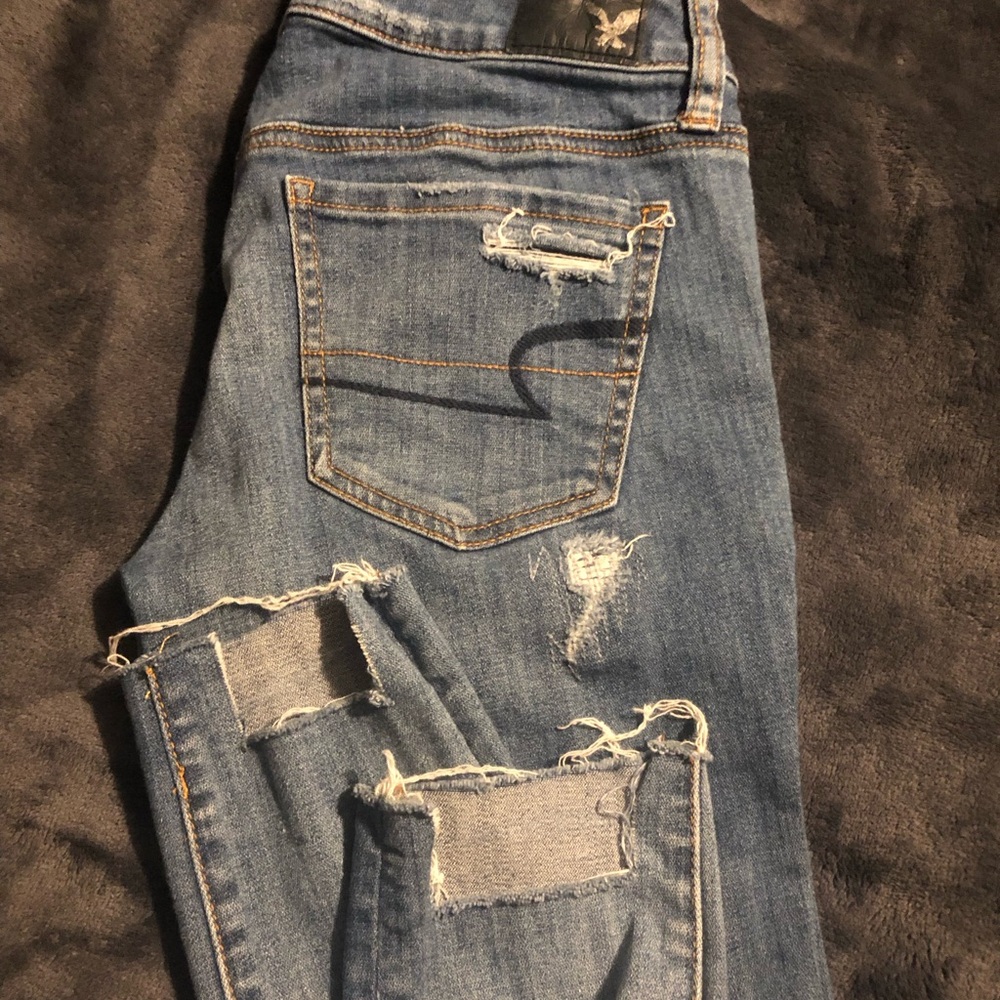 Women's Distressed Blue Jeans